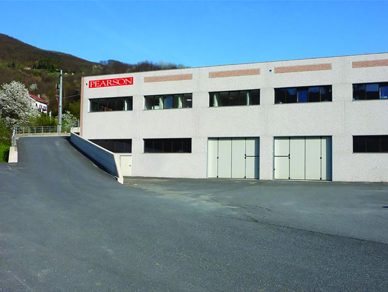 The Guglielmo Pearson plant in Campo Ligure, with the red sign on the facade